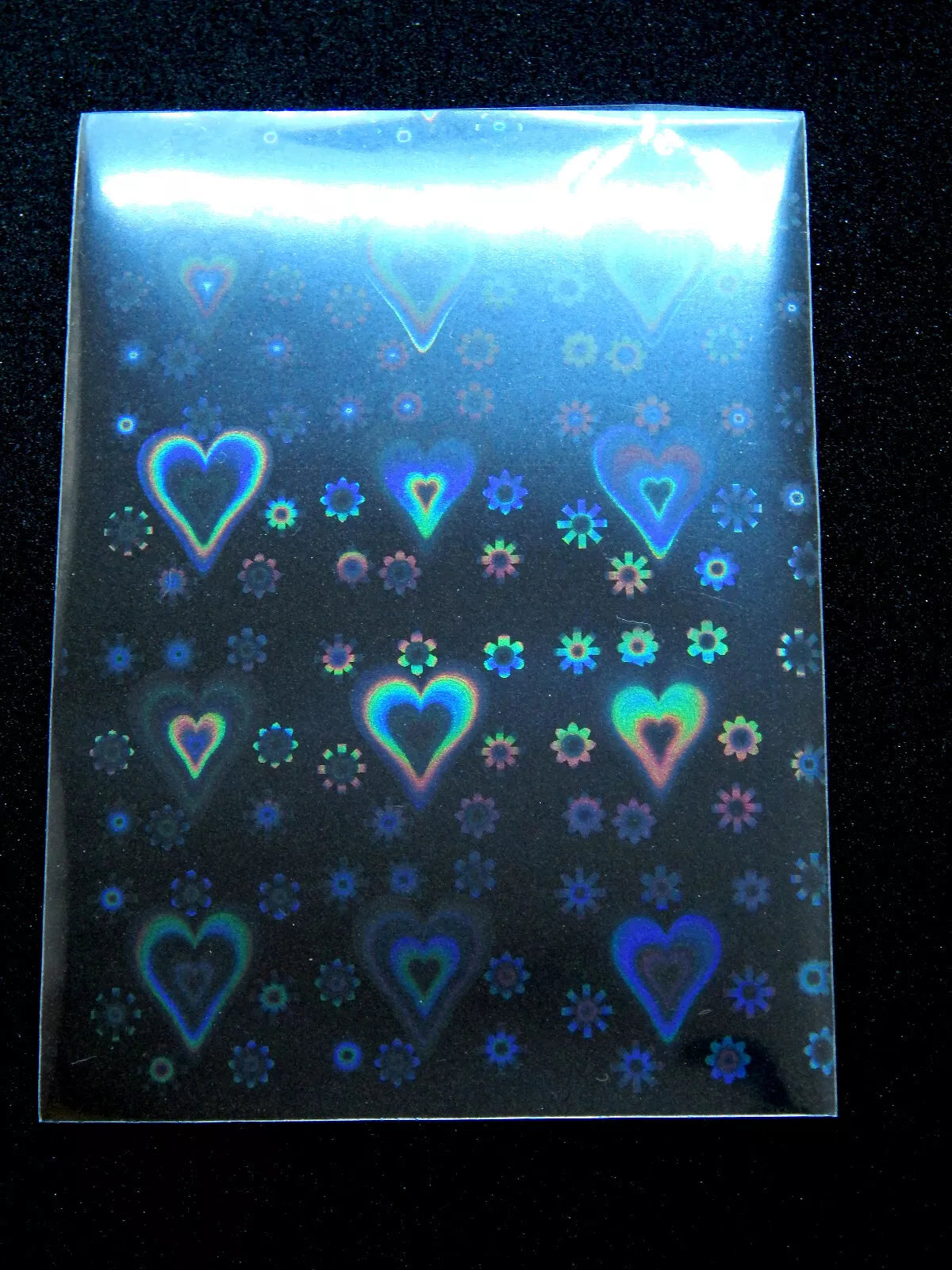 20 vnt. holografinės kortelių įmautės (65×90 mm) – Pokémon, MTG, TCG kortoms, įvairūs dizainai